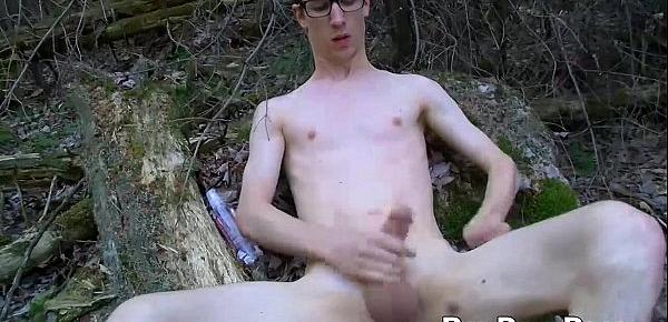  Nature loving twink Sacha West works a load among the trees